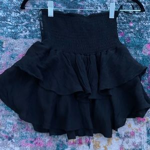 Black ruffle mini skirt
